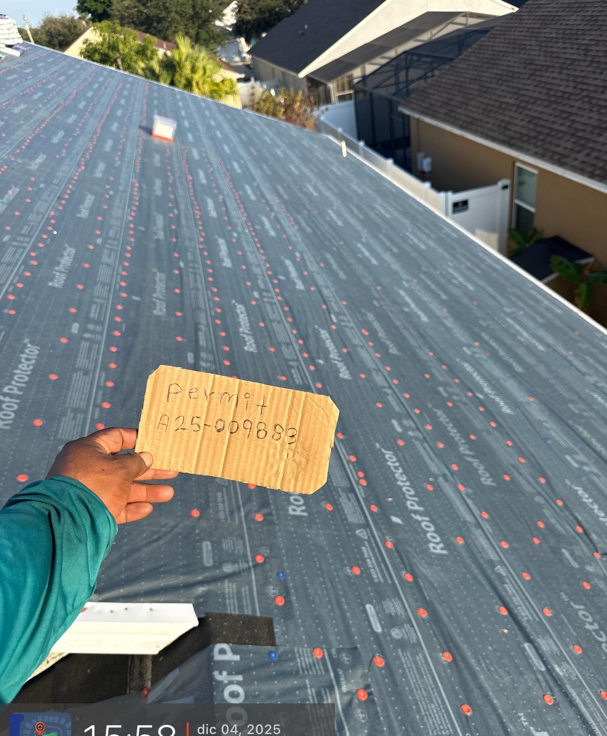 Synthetic underlayment installed across a full slope, ready for shingles